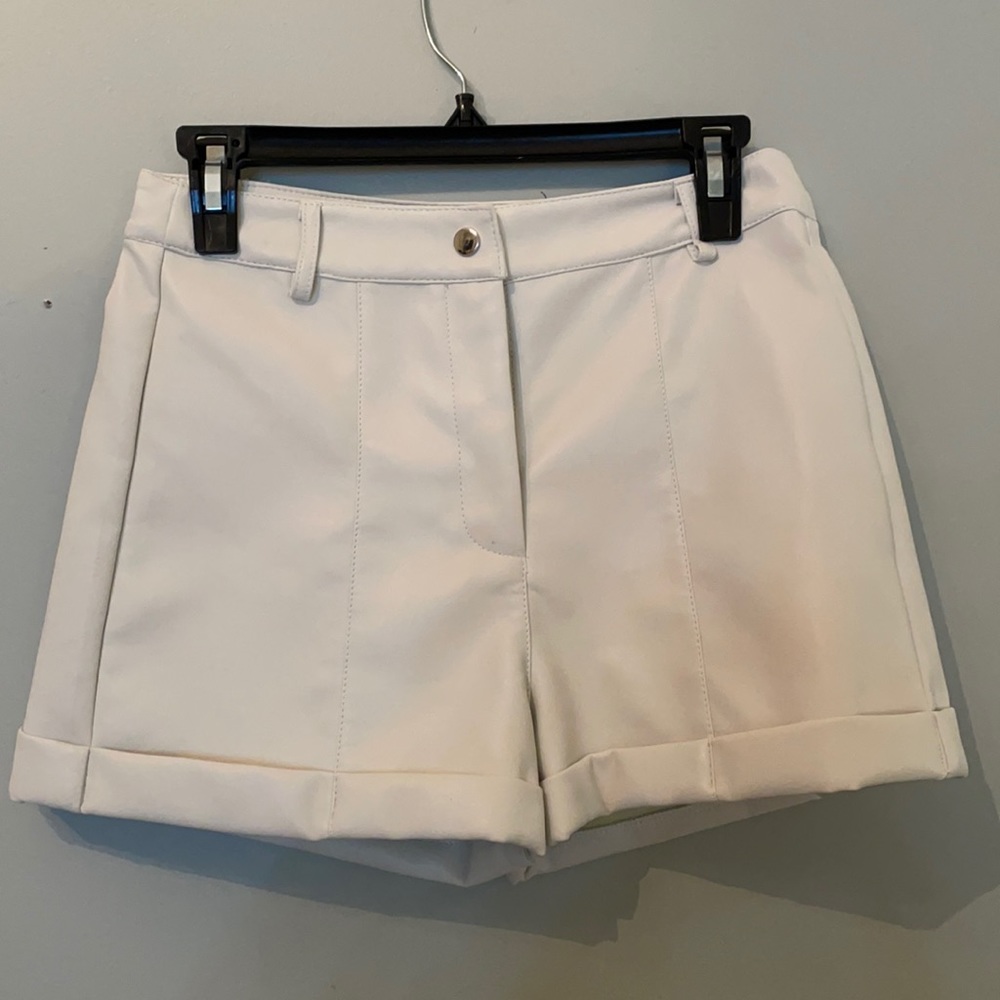White leather shorts